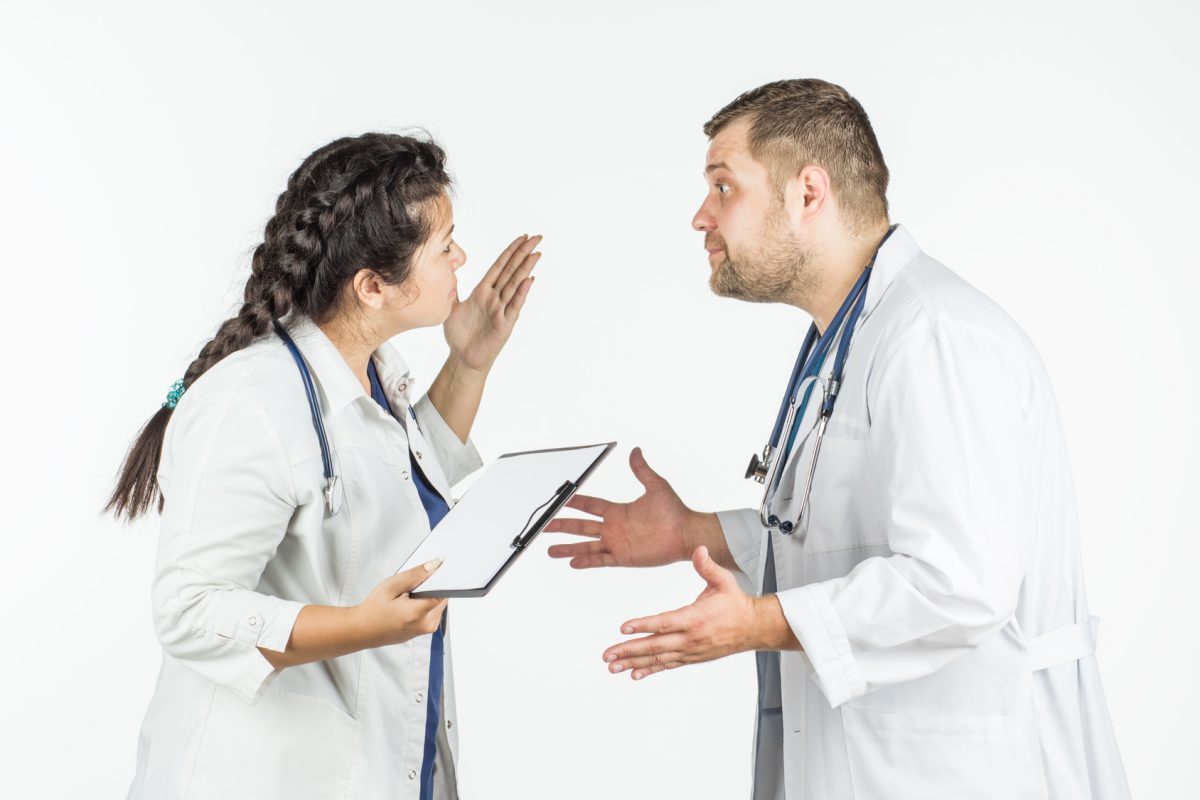 the doctor swears by the nurse. on a white background.