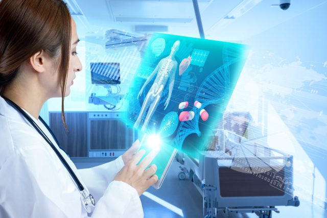 Female doctor operating futuristic medical interface.